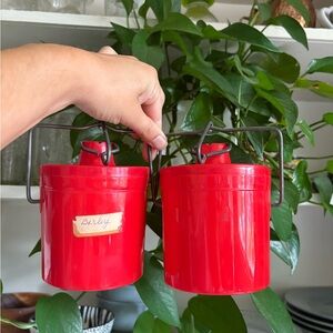 Vintage red containers with bail lid